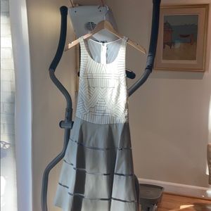 Dress made of rubber and shear material.